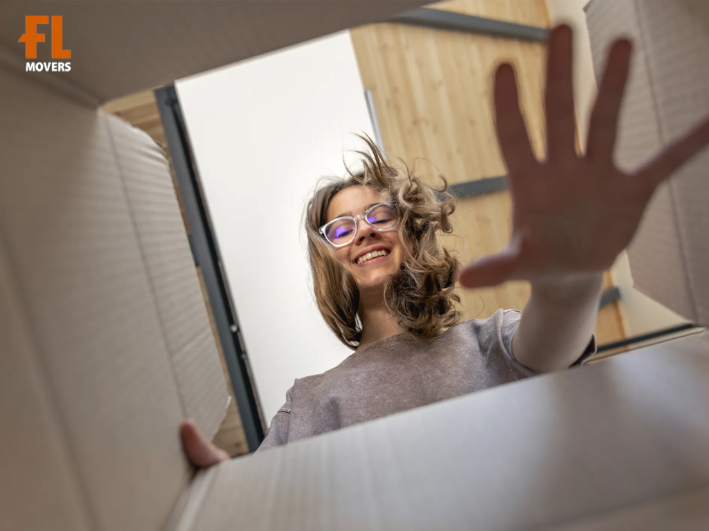 Spring Movers Customer Unpacking Boxes After Easy Moving