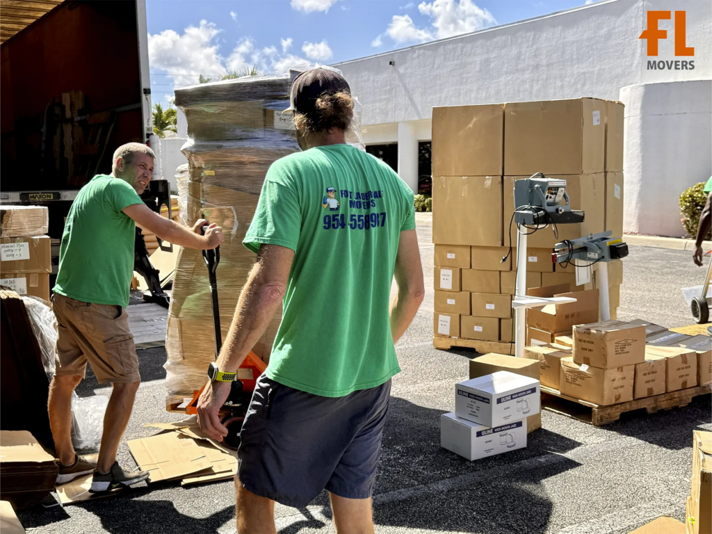 Team Members Packing Customer Boxes and Furniture in Truck